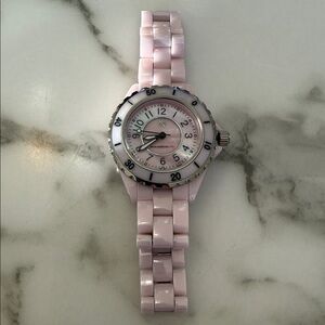 Isaac Mizrahi Live women’s pink sport watch with bracelet style band